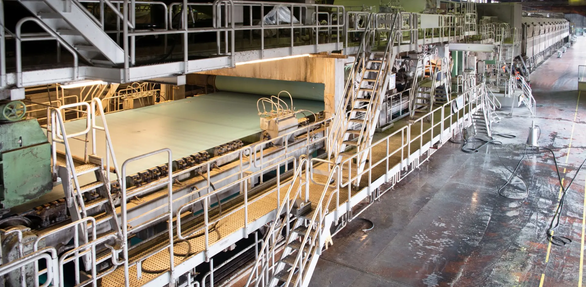 A large machine with stairs going down it.